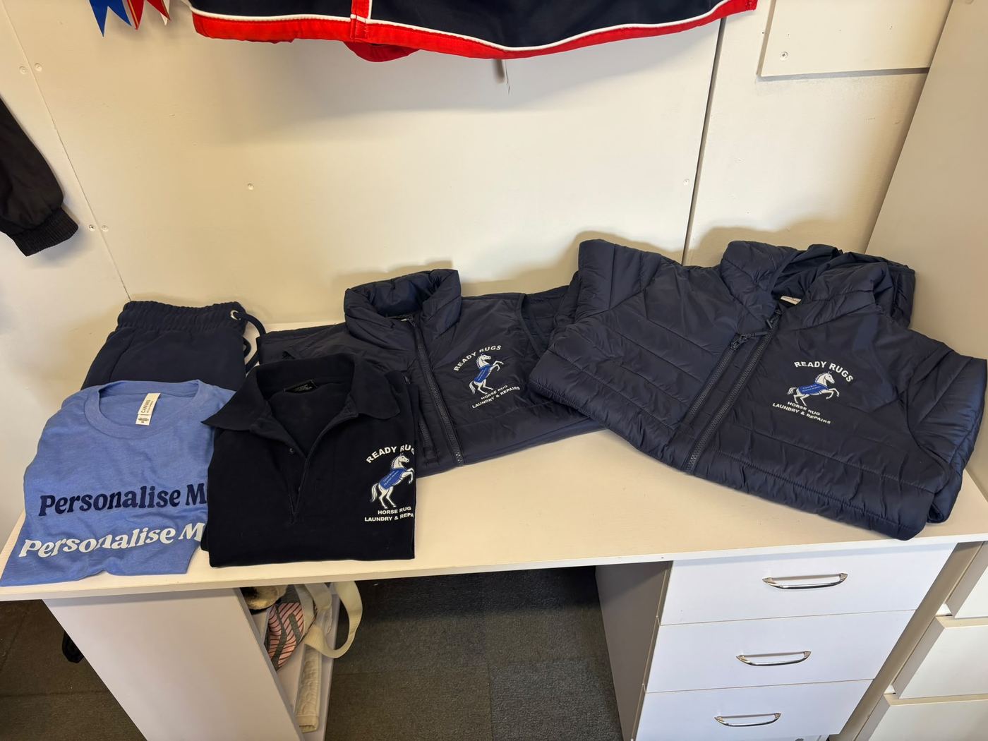 Personalised navy jackets and t-shirts