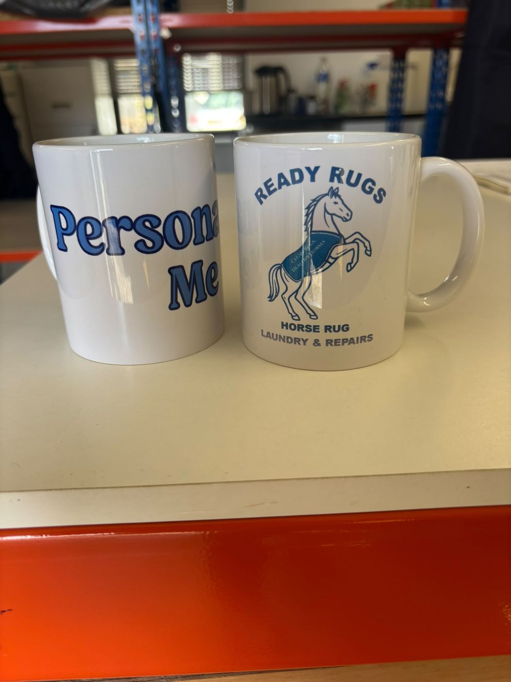 Personalised mugs including a Ready Rugs mug