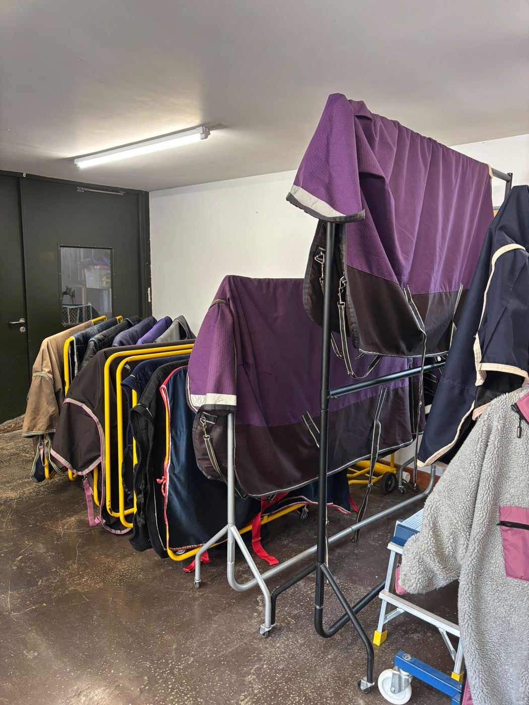Turnout rugs on drying stands