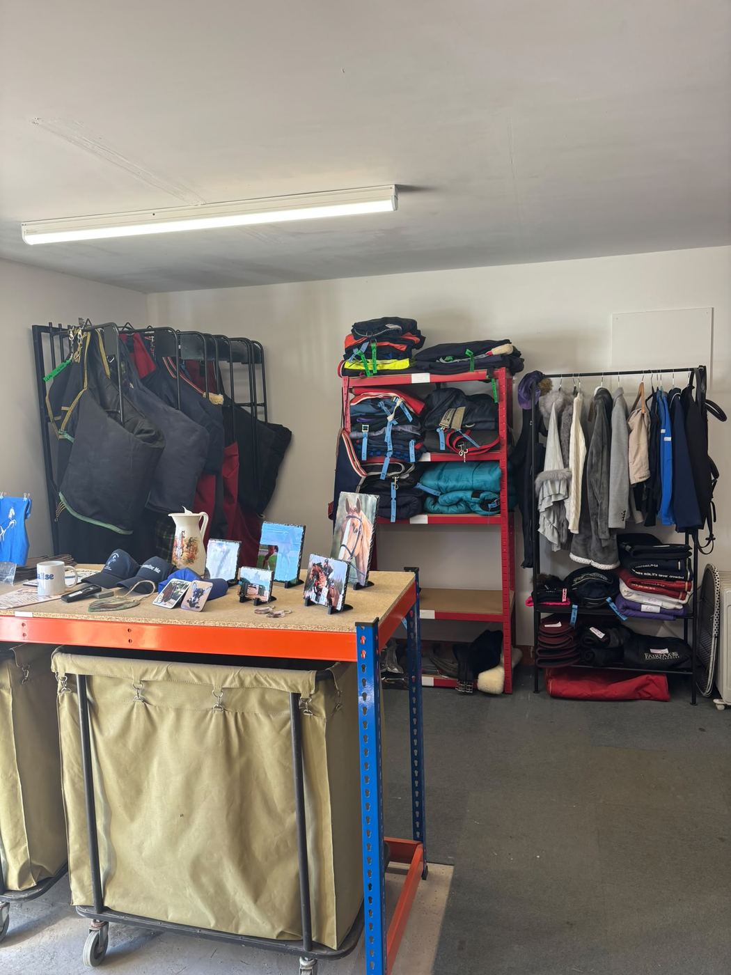 Inside the shop: rugs, tack and clothing on display